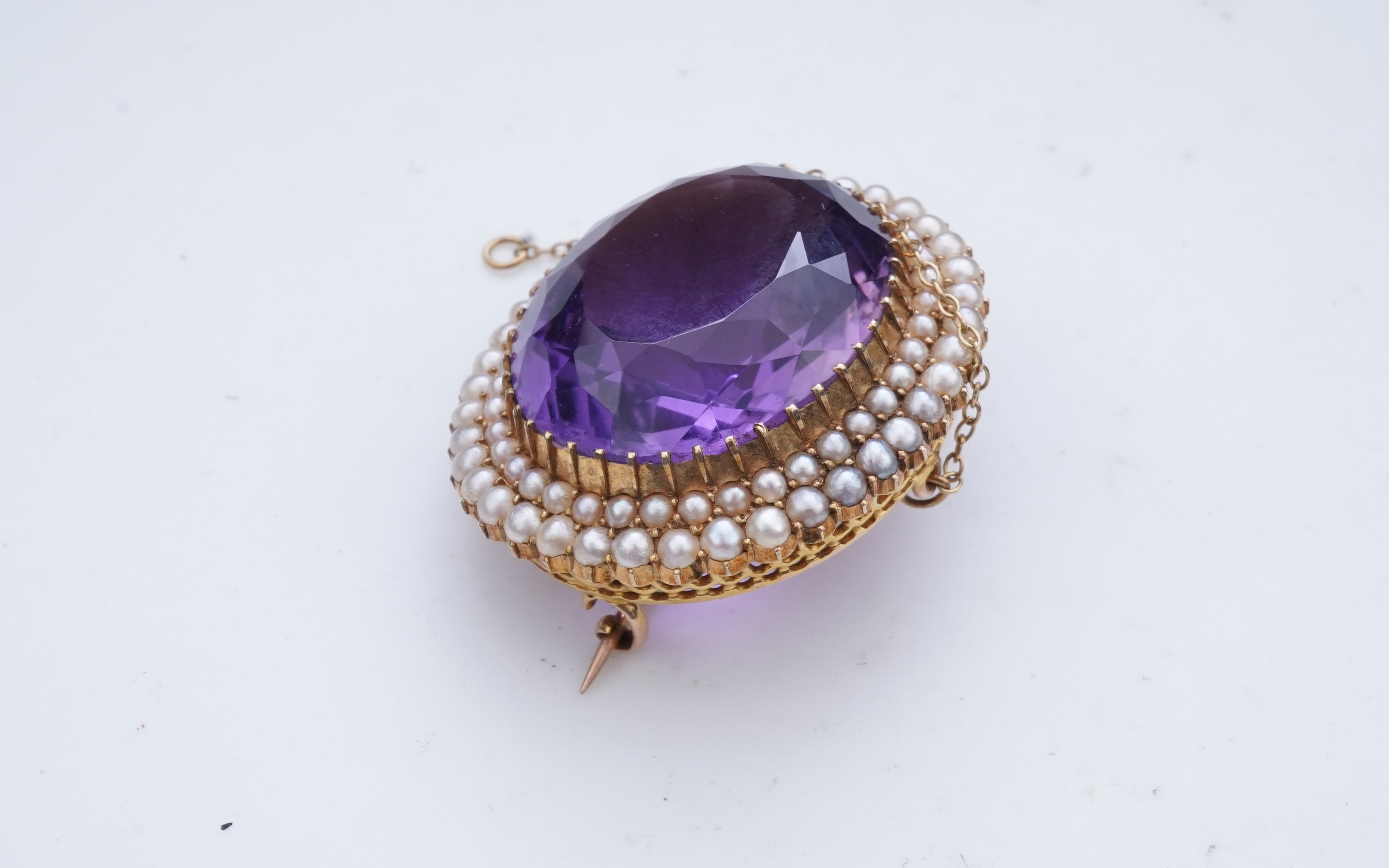An Edwardian amethyst and seed pearl brooch, early 20th century